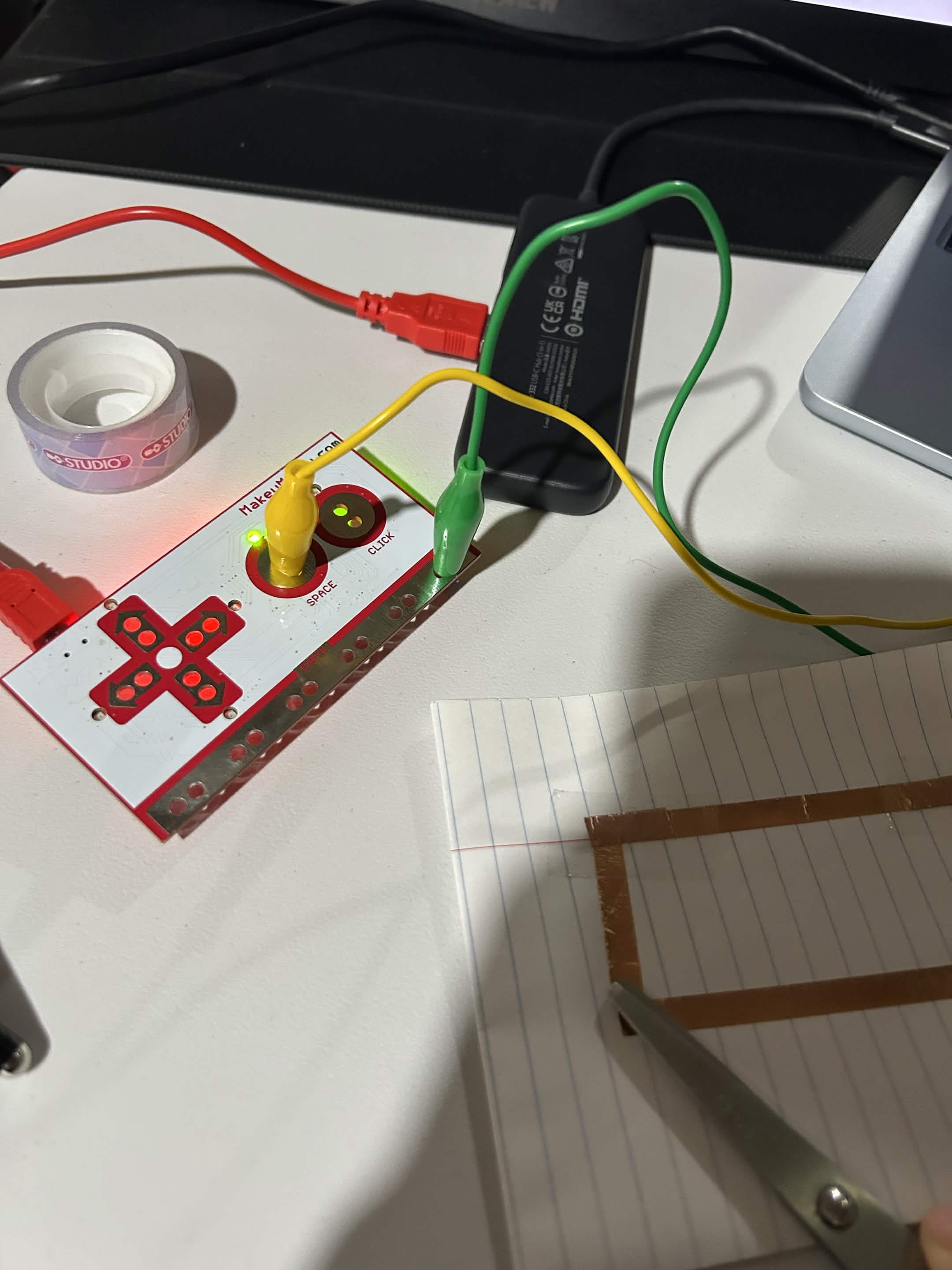 I tested numerous different conductive materials. I started off with my scissors.