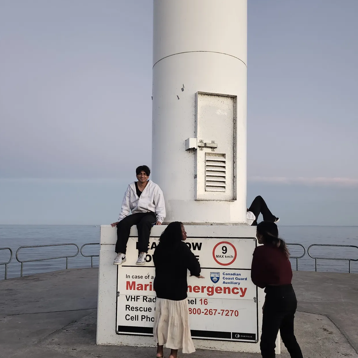 My friends in downtown Oakville under the lighthouse.