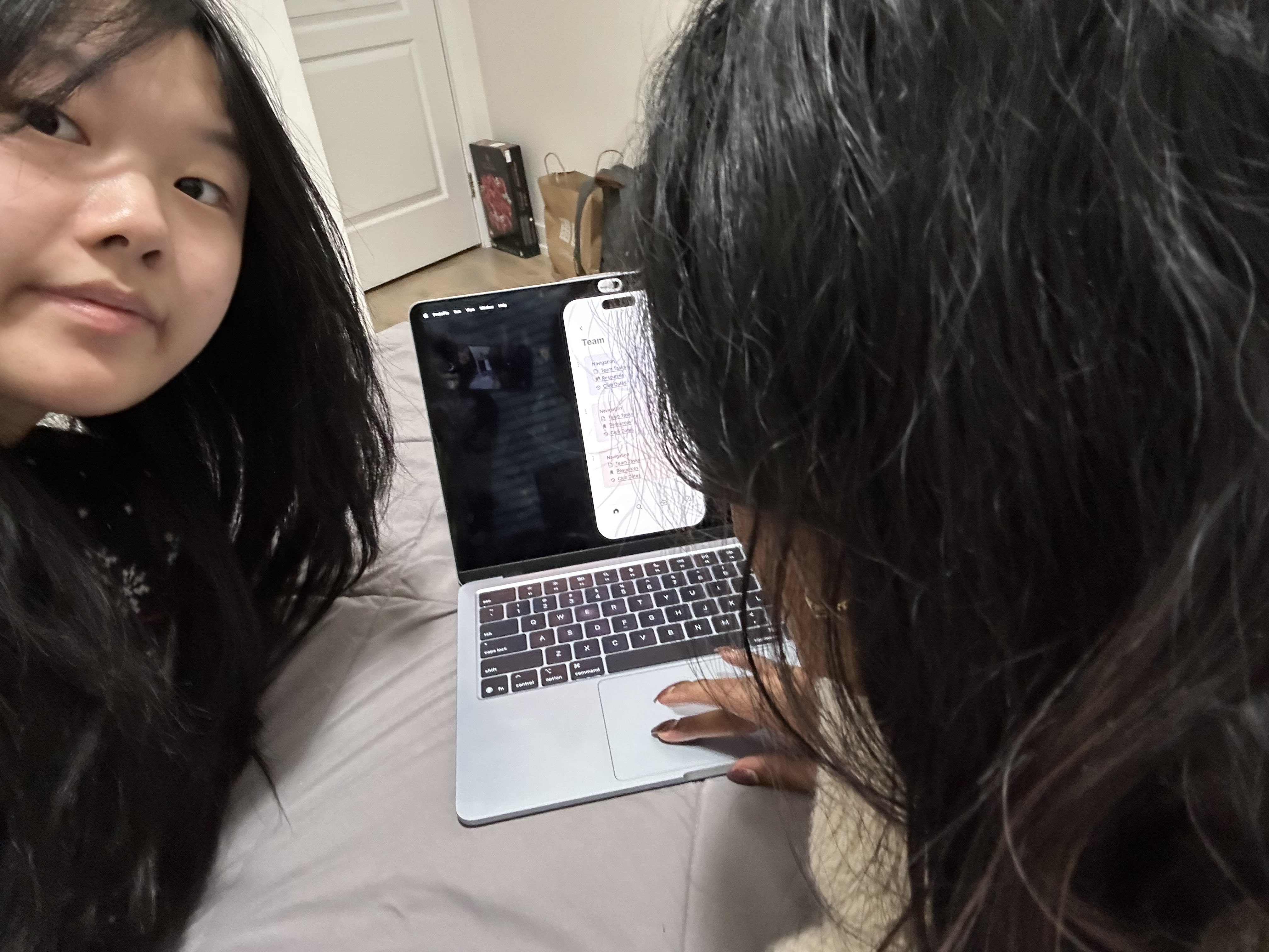 In this selfie, my friend is user testing one of my digital prototypes for a project to make an app more accessible for a people with a certain disability.