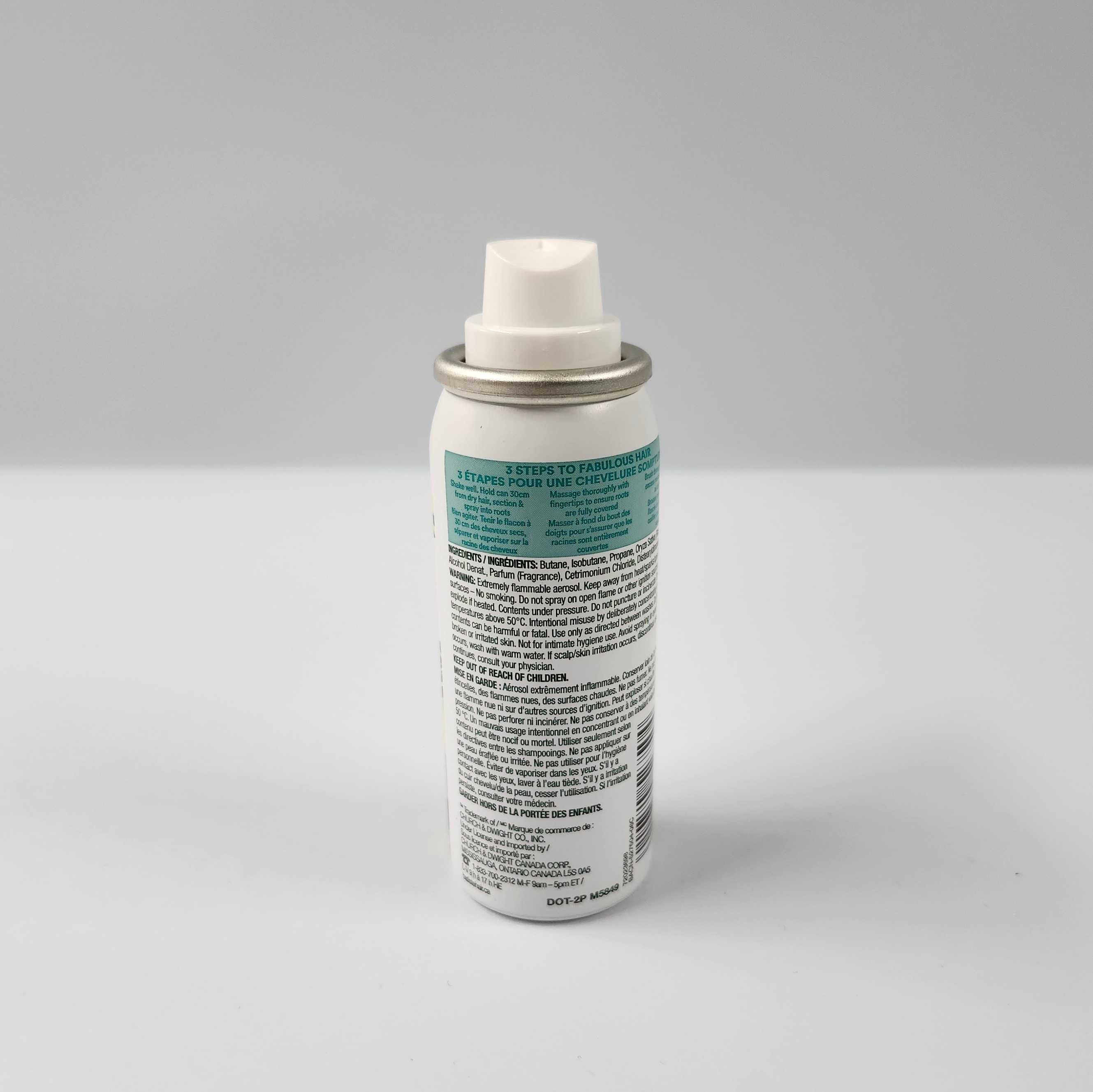 This is the back of the mini dry shampoo bottle. On the back it has the ingredients and steps on how to use it.