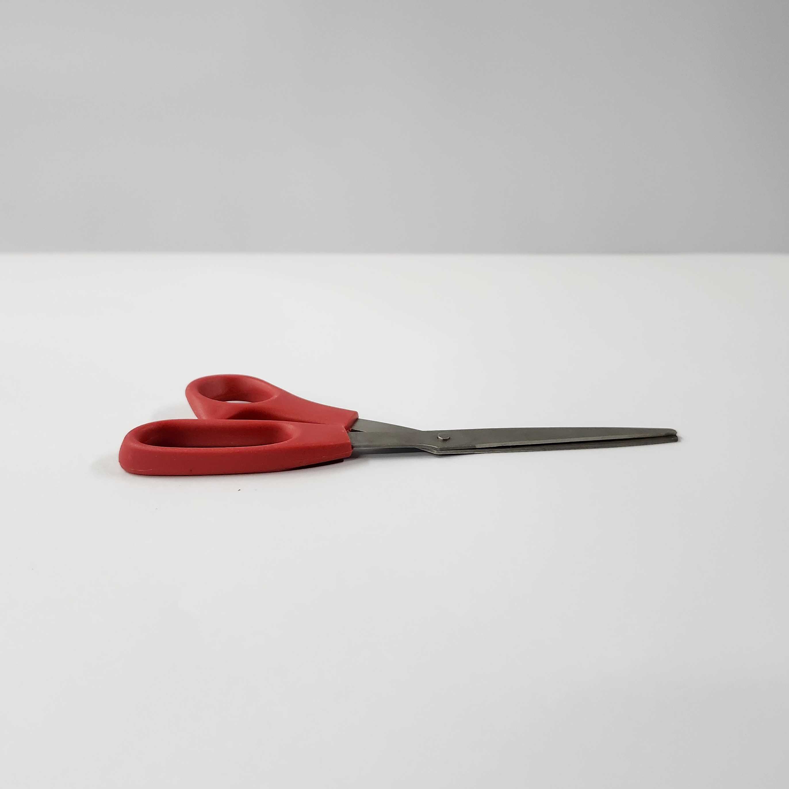 This is the pair of scissors from a side view.